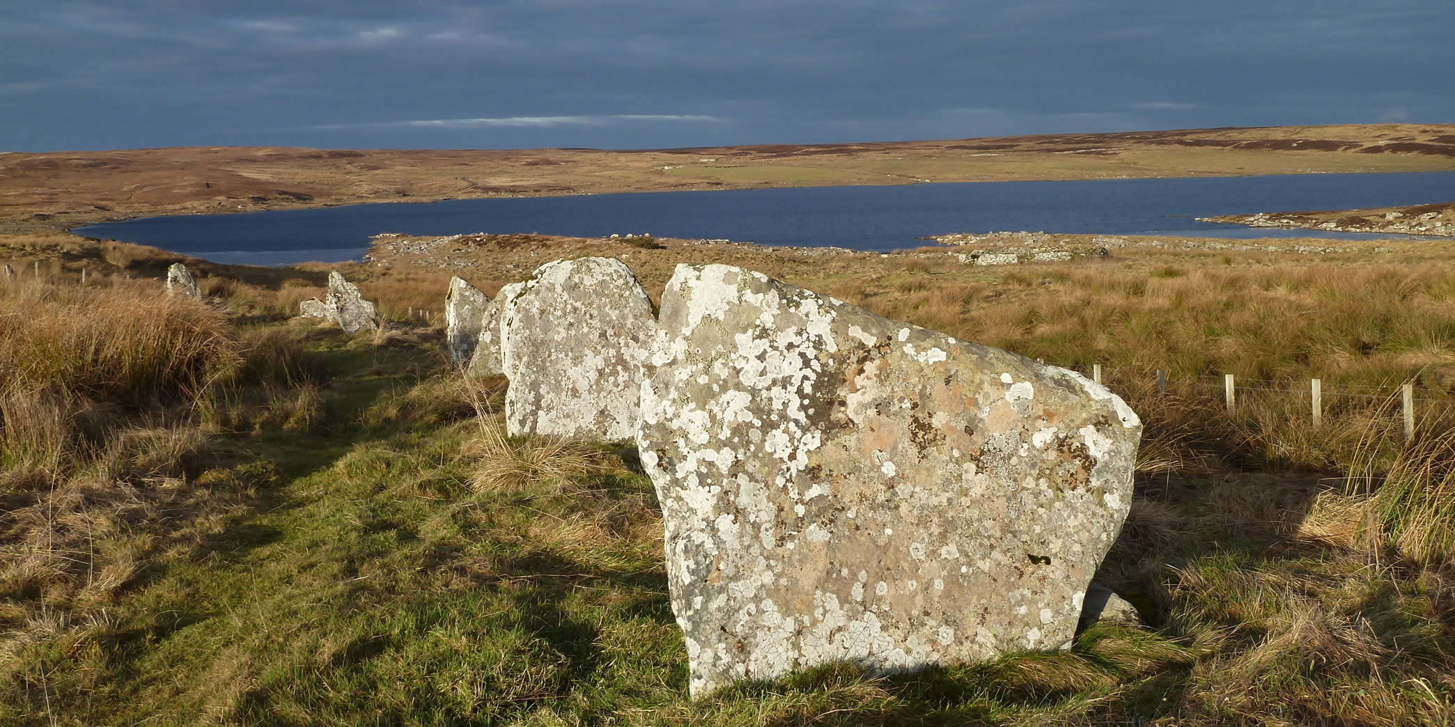 Achavanich standing stones are around 4,000 years old with views over Loch Stemster.