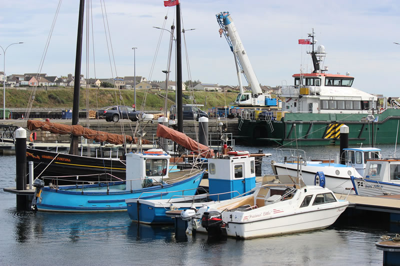 Wick harbour traditional and leisure fishing boat